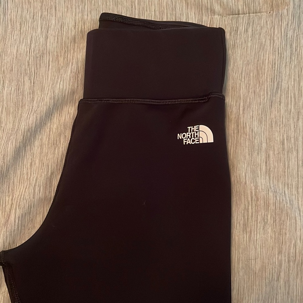 The north face black leggings are never worn without tags